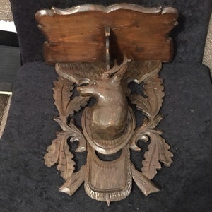 Antique Black Forest carved wooden shelf with Stag head and Oak leaves