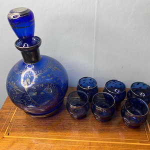 Vintage Cobalt Blue Decanter with silver floral decoration with matching Glasses