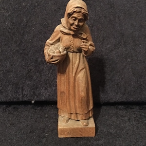Antique Black Forest Hand carved wooden Figure of a Old lady with basket