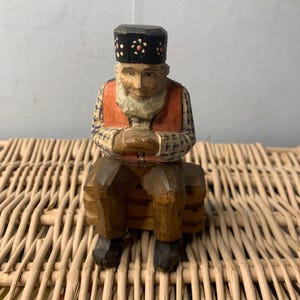 Vintage Black Forest Hand carved wooden Figure of a Old Steated man