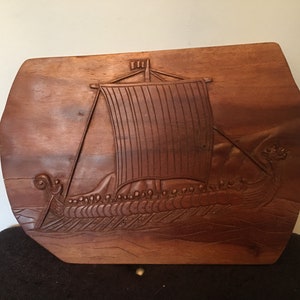 Vintage hand carved wooden wall plaque of a Viking ship by David Clegg