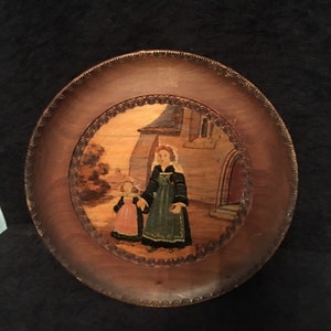 Vintage Flemish turned and hand painted plate