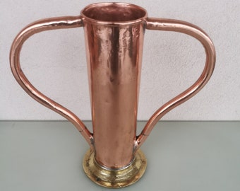 Pot with copper handles