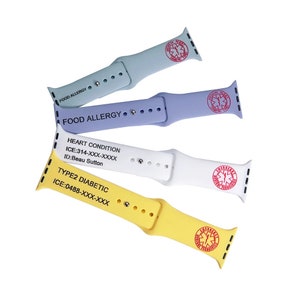 May include: Four medical alert Apple Watch straps in pastel shades: light blue, lilac, white, and yellow. Each strap features a red medical alert symbol and text indicating medical conditions like "FOOD ALLERGY", "HEART CONDITION", and "TYPE2 DIABETIC".