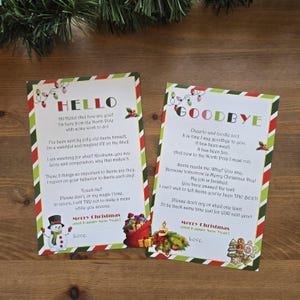 May include: Two Christmas-themed cards with festive borders. One card says "HELLO" and the other says "GOODBYE." Both cards feature holiday-themed illustrations, including a snowman, gifts, and a candle.