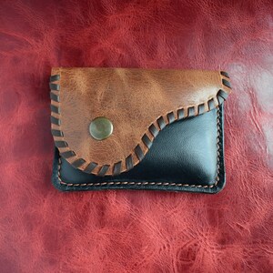 Small vintage retro black and brown leather wallet