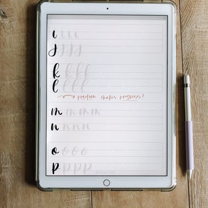 May include: A digital tablet screen displaying handwritten letters in black ink on a white background. The letters are 'i', 'j', 'k', 'l', 'm', 'n', 'o', and 'p'. The text "practice makes progress!" is written in red ink. The tablet is on a wooden surface.