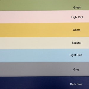 May include: A set of seven paint swatches in different colours, including green, light pink, ochre, natural, light blue, grey, and dark blue.