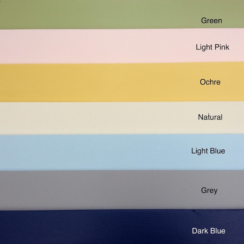May include: A set of seven paint swatches in different colours, including green, light pink, ochre, natural, light blue, grey, and dark blue.