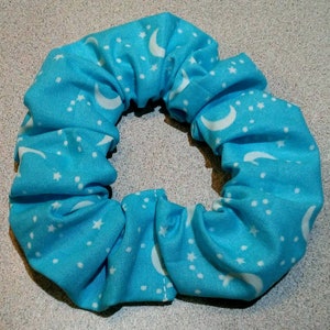 Blue, white, glow in the dark, crescent moons, stars, galaxy, space, universe, cosmos, witch, hair tie, scrunchie, elastic, hair accessory