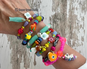 Color me Happy//fun colorful charm and beaded stretch bracelets each sold separately