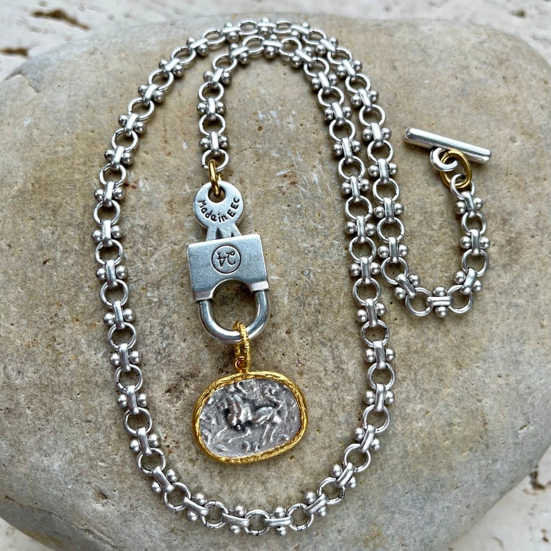 Roman Empire//silver plated specialty chain with lock-style toggle and Roman-replica lion medallion//choose style//each sold separately 3. 19.75" with charm