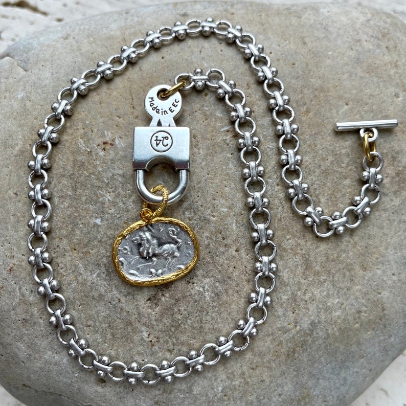 Roman Empire//silver plated specialty chain with lock-style toggle and Roman-replica lion medallion//choose style//each sold separately 2. 16.75" with charm