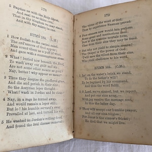May include: Two pages from a vintage hymnal book with the text of hymns 164 and 165. The hymns are titled "How foolish to the carnal mind" and "Lo! on the water's brink we stand".