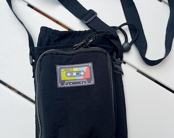 The Orbit Crossbody Carbon