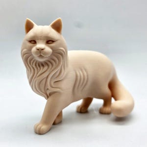 May include: A light beige cat figurine with detailed fur texture. The cat is in a walking pose, with its tail curved. The figurine has a detailed face and is set against a white background. The cat's fur is intricately carved.