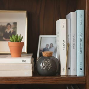 Skull Mini Keepsake Urn – Sassy Memento Mori Ceramic Jar – Small Pet or Human Ash Holder – Gothic Pottery with Cork Top