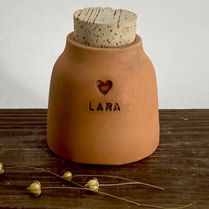 Simple unglazed brown ginger terracotta pet urn, cat urn