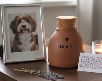 Simple unglazed brown ginger terracotta pet urn, cat urn