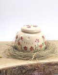 Floral Ceramic Pet Urn: Cherry Red Forget-Me-Not Design product logo