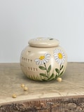 Daisy Cat Urn, yellow cat urn, Creamation Urn, Pottery Urn for Pets, Cat Urn product logo
