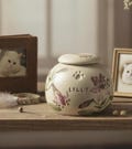 Handpainted Lily Pet Urn: Ceramic Animal Ashes Urn product logo