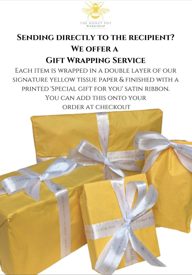 May include: Four yellow gift boxes with white satin ribbon tied in bows. The ribbon has the text "Special Gift For You" printed on it. The boxes are stacked on top of each other. The Honey Pot Workshop logo is visible on the boxes.