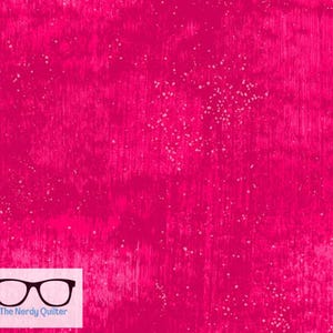 May include: A bright pink fabric with a speckled white pattern. The fabric has a textured, slightly distressed look.
