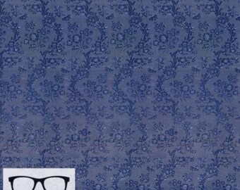 May include: Blue fabric with a small white floral pattern. The fabric has a textured, embossed look. The fabric is measured in inches.