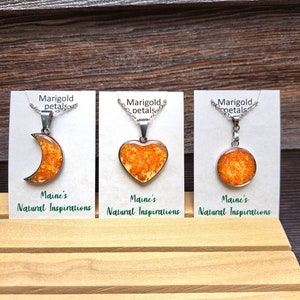 Pressed flower necklaces. Marigold petals. Floral jewelry. Orange flowers. Heart shape,  moon pendant. Made in Maine USA