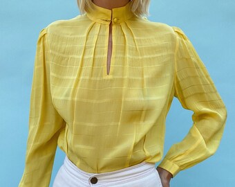 bright yellow silk blouse