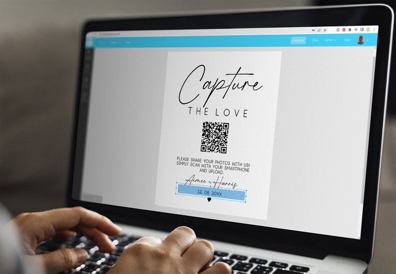 May include: A laptop screen displaying a wedding photo booth sign with a QR code. The sign reads "Capture the Love" and includes the names "Aimee & Harris" and the date "12. 08. 20XX".