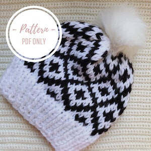 May include: White and black knitted hat with a geometric pattern and a white pom pom on top. The hat is labelled "Pattern - PDF Only".