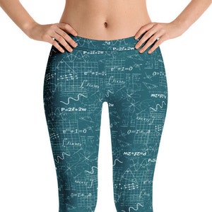 May include: Teal leggings with a white print of mathematical equations and graphs.