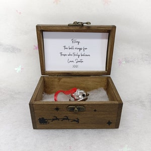 A beautiful large magical believe bell in a rustic wooden box for a stocking filler/Christmas eve box or a gift from Santa/Father Christmas.