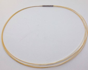Multi-row necklace, gold/silver bayonet