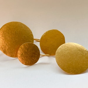 Gouden oorbellen ronde schijfjes hangende oorbellen
