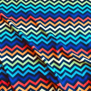 Rainbow Chevron Jersey Fabric. Colourful organic stretch cotton knit