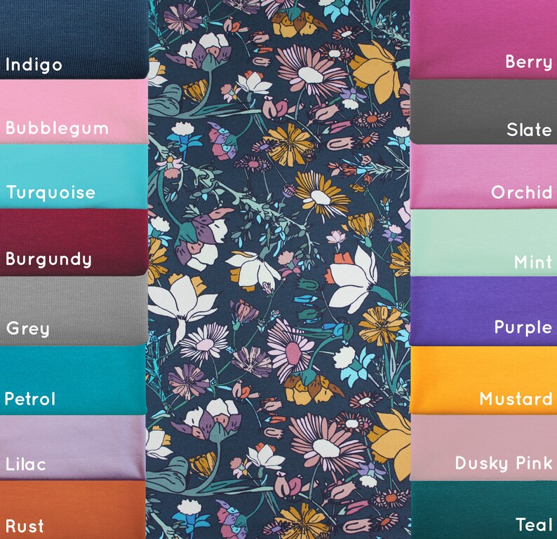 May include: A swatch card with 12 fabric samples in various colors, including indigo, bubblegum, turquoise, burgundy, grey, petrol, lilac, rust, berry, slate, orchid, mint, purple, mustard, dusky pink, and teal. The fabric samples are arranged in two columns, with the colors on the left side of the card and the names of the colors on the right side of the card.