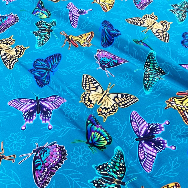 Whimsy, Butterfly Jersey Fabric. Colourful Butterflies Organic Cotton Elastane knit fabric