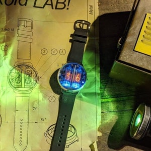 Steampunk Nixie Tube Clock Rare Wrist Watch Nixoid Next (Metal, Sapphire, Splash Resistant)