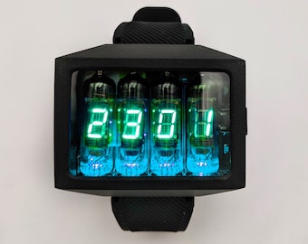 May include: A black wristwatch with a square face and a black rubber band. The watch face features four green digital display tubes showing the time as 2:30.