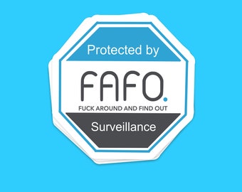 May include: A stack of white octagonal stickers with a blue border and text. The top sticker reads "Protected by FAFO. FUCK AROUND AND FIND OUT. Surveillance" in white and black text on a blue and gray background. The background is light blue.