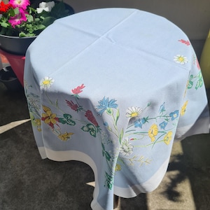 Flowers on blue background .Swedish tablecloth.Vintage 60s
