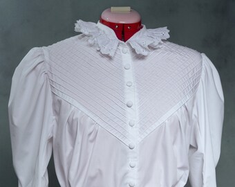 Suffragette white blouse inspired in the Victorian industrial style, loose and conformable to wear