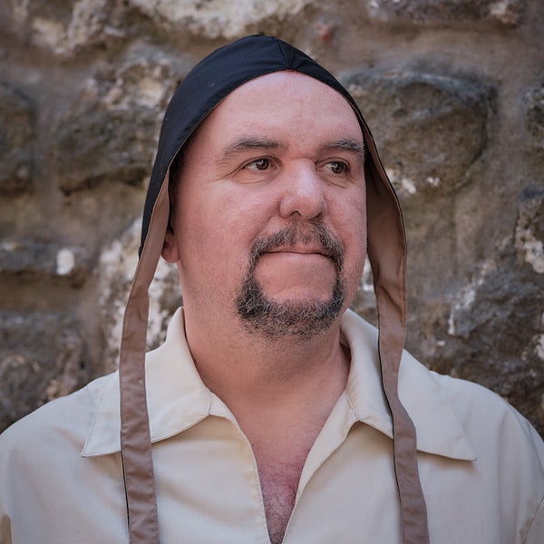 coif hats worn by peasants in medieval villages, in the past times