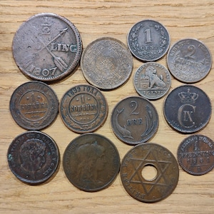 Old bronze and copper coins Lot of 13 better quality and rarer numismatic coins from Russia, France, Germany, Japan, Denmark