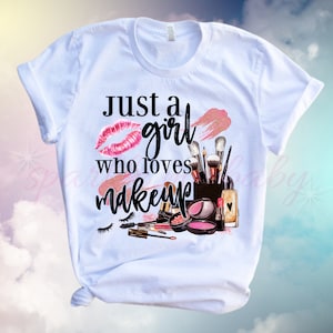 May include: White t-shirt with the text "Just a girl who loves makeup" in black lettering. The text is surrounded by a pink lipstick print, makeup brushes, and other makeup products.