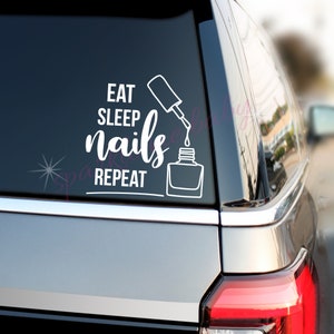 May include: White vinyl decal with the text "Eat Sleep Nails Repeat" and a graphic of a nail polish bottle with a brush dripping polish.