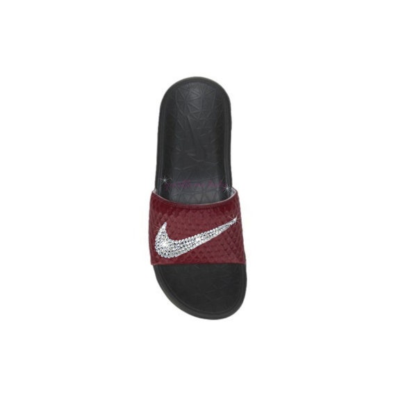 maroon nike slides with gold swoosh